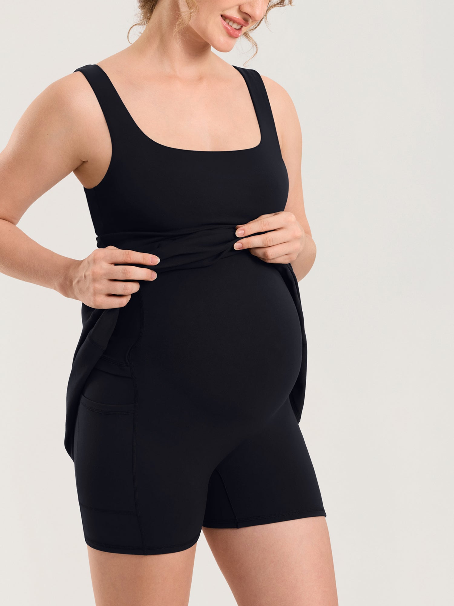 MOMANDA Women's Natrelax® Maternity Mini Dress - Easy Peezy Black @model_info:MOM3
